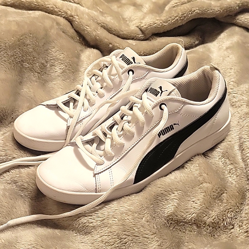 White Leather Pumas women's size 7.5